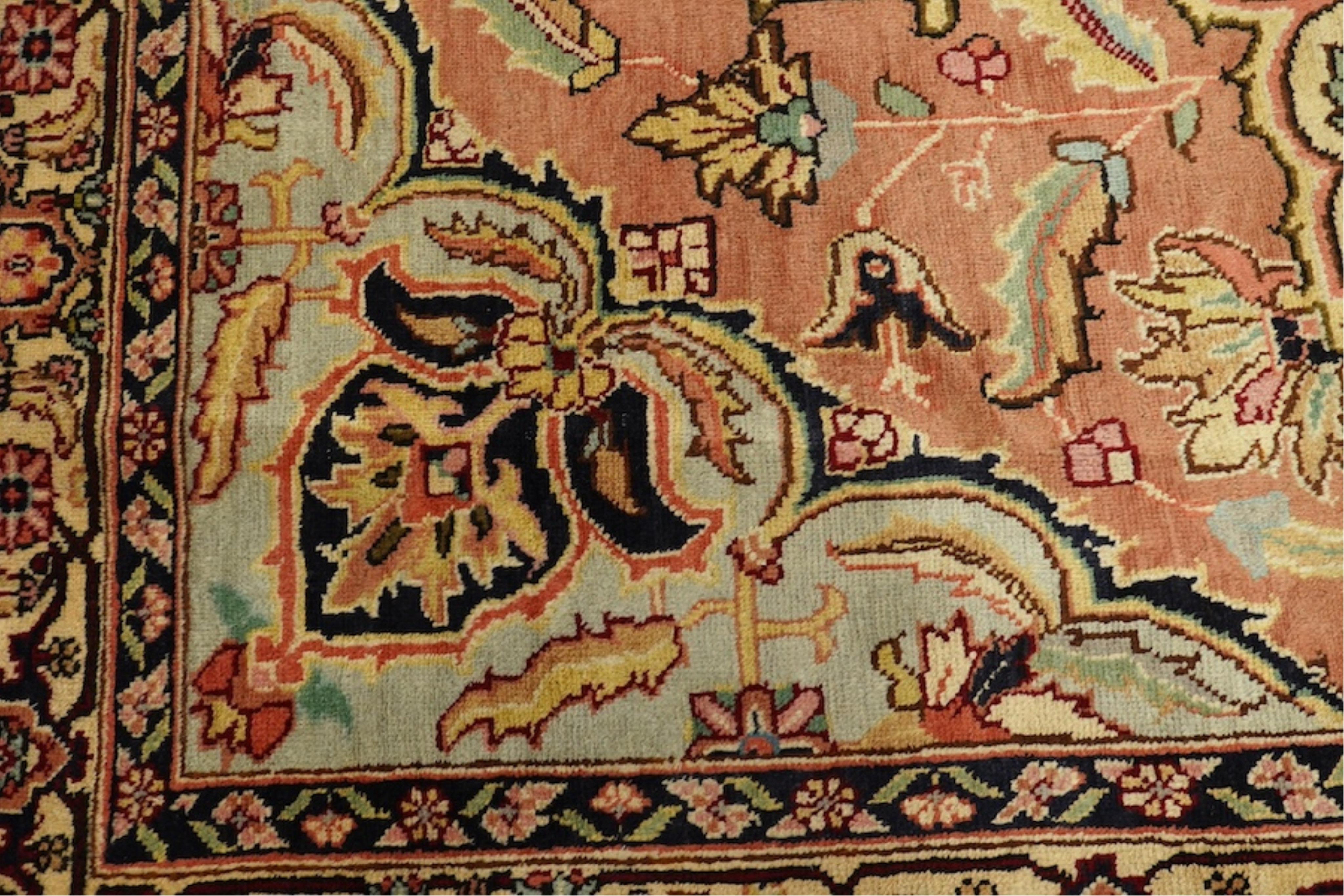 An Ardabil pale red ground carpet, 286 x 192cm. Condition - good